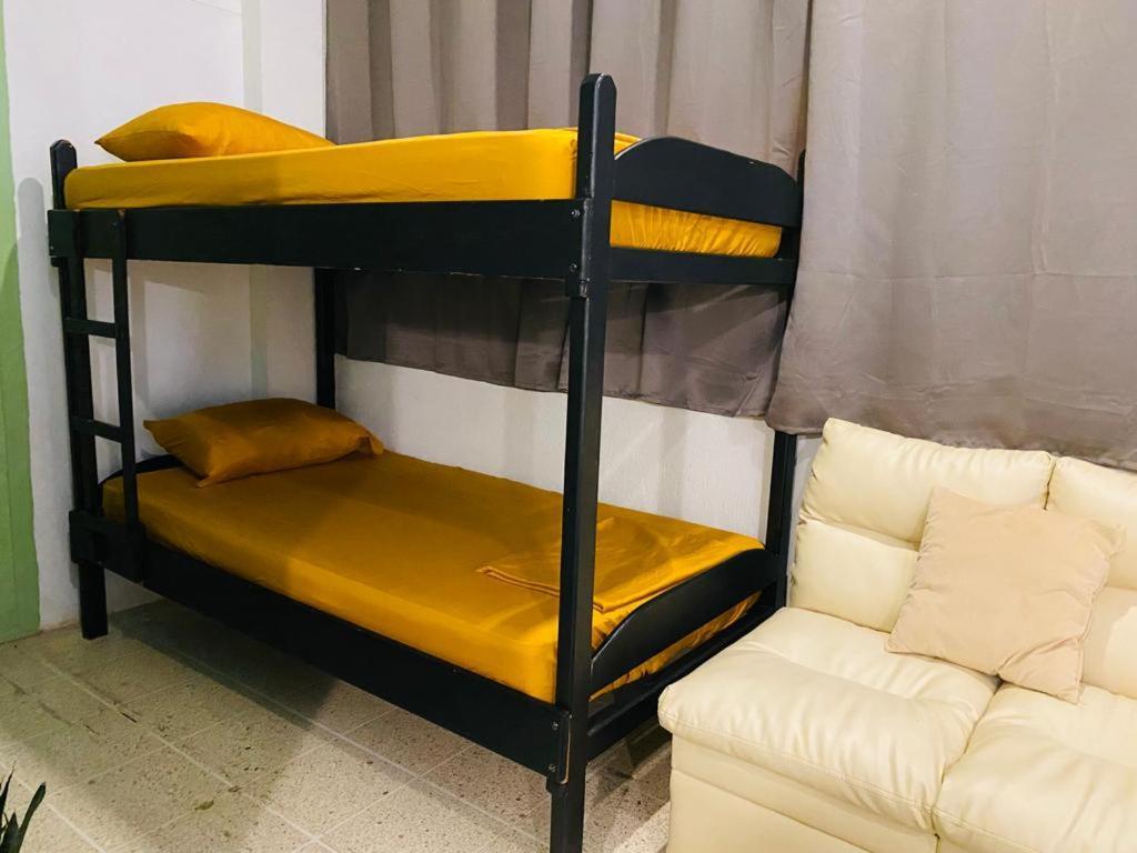 Hotel Adventure Lodge Jaco Bagian luar foto