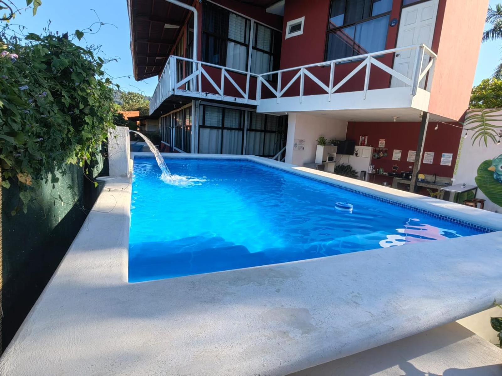 Hotel Adventure Lodge Jaco Bagian luar foto